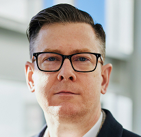 Executivo de empresa de trading de criptomoedas e CEO Alexander Hughes em retrato